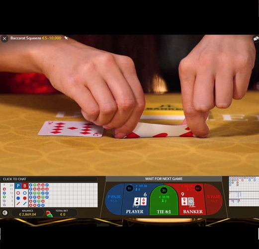 Live Dealer folds the baccarat card