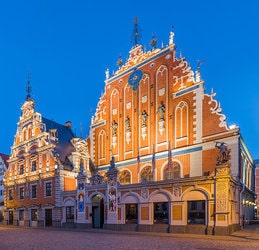 House of Blackheads and St. Peter's Church Tower at dusk, Riga, Latvia